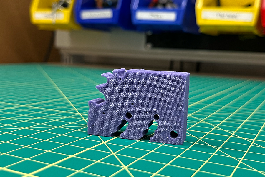 A purple, squishy object capable of locomotion, as fabricated during a demonstration by Northwestern researcher Sam Kriegman.