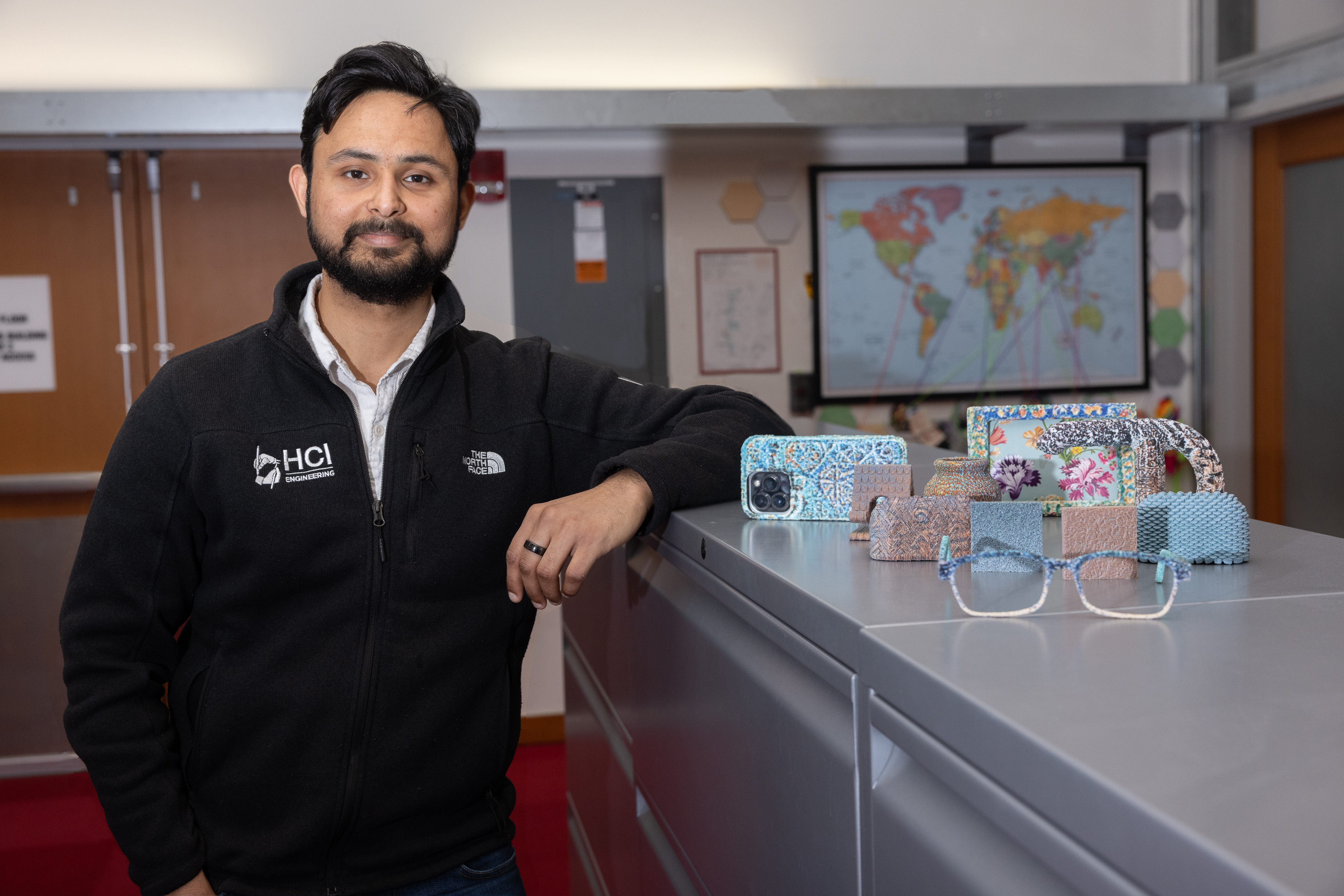 PhD student Faraz Faruqi, lead author of a new paper on the project, says that TactStyle could have far-reaching applications extending from home decor and personal accessories to tactile learning tools (Credits: Mike Grimmett/MIT CSAIL).